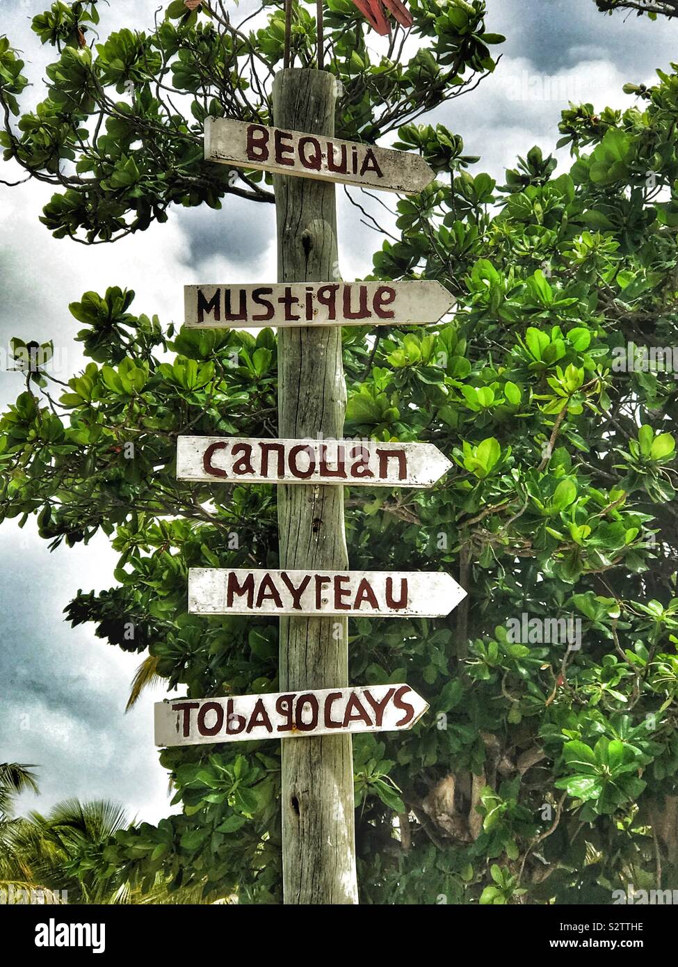 Direction Sign for Grenadine Islands on Palm Island - St.Vincent and the Grenadines - Smartphone Captured Stock Image