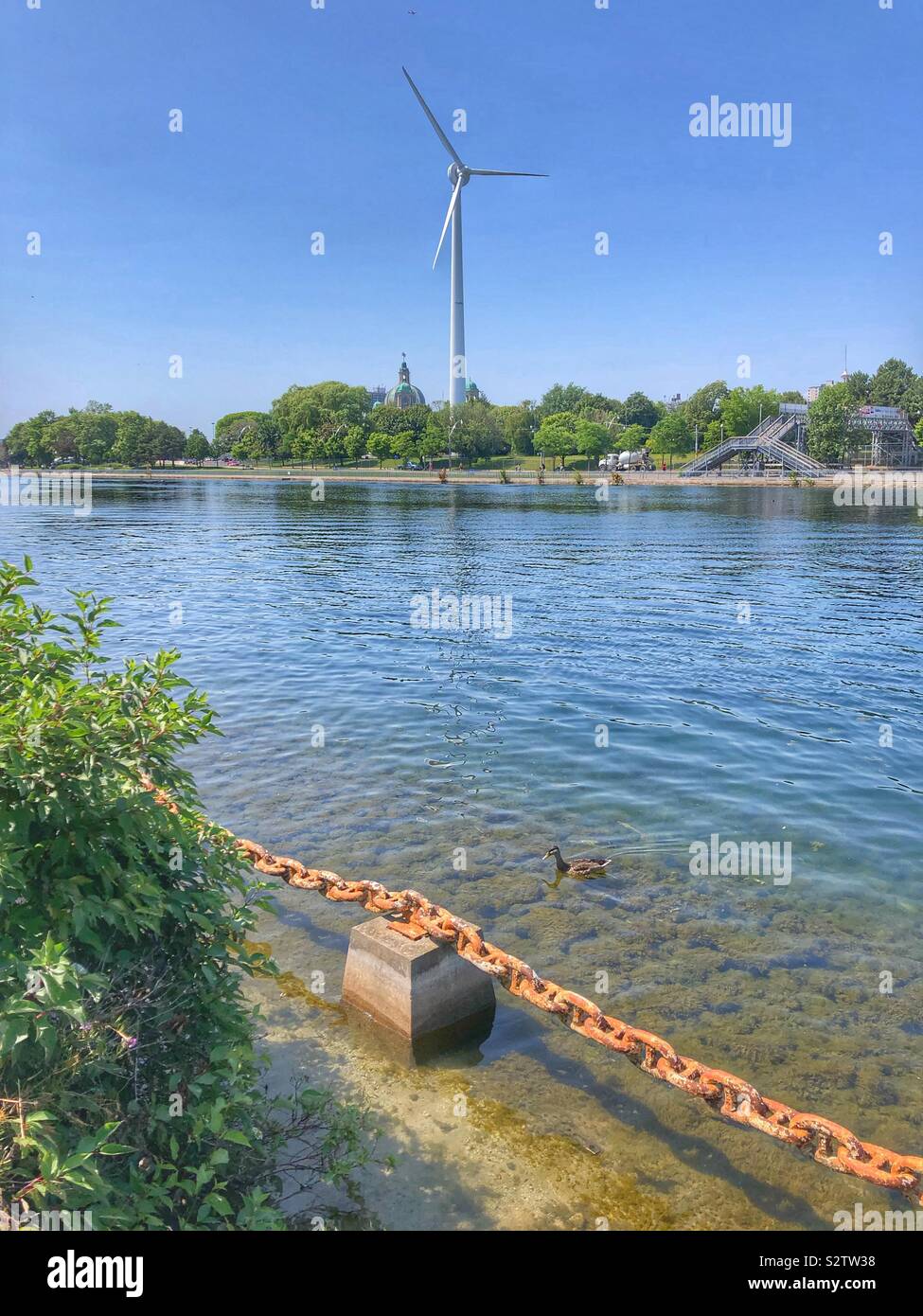 One lone wind turbine on the waterfront in Toronto, Canada. - Smartphone Captured Stock Image