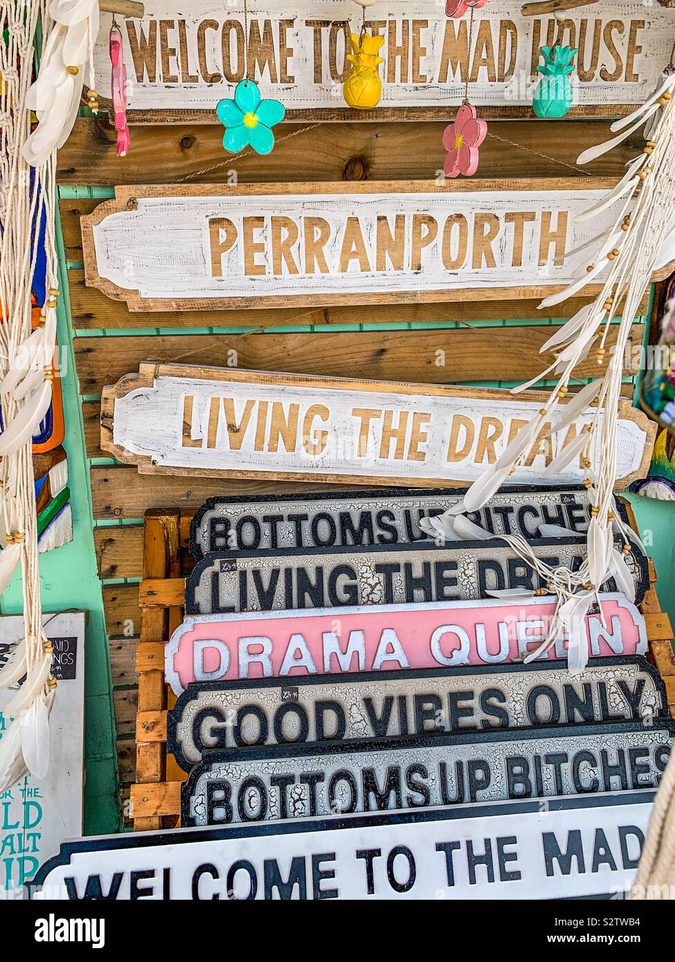 Several wall signs for sale in Perranporth Cornwall - Smartphone Captured Stock Image
