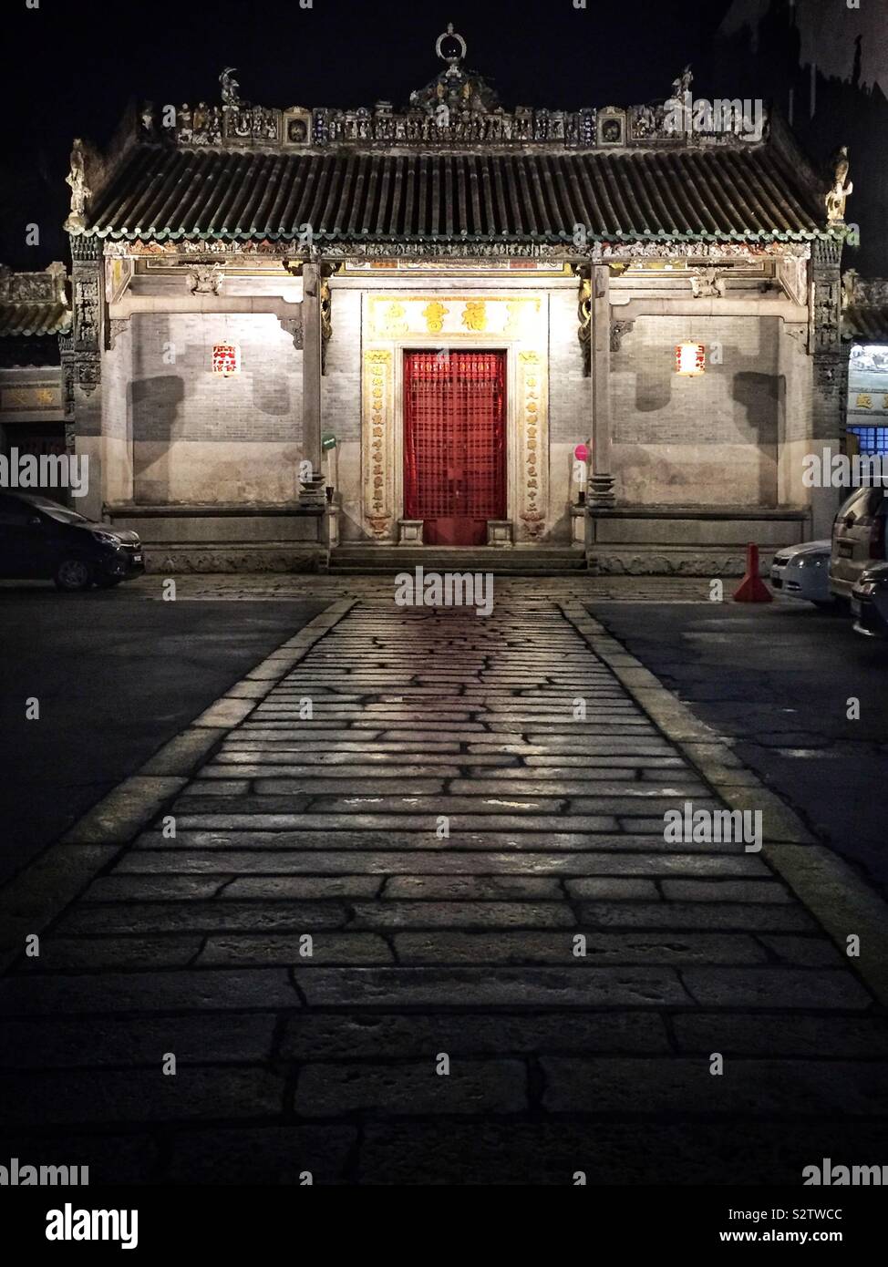 The Ng Fook Thong Temple of the Cantonese Districts Association at night in the Old Town of George Town, Penang, Malaysia Stock Photo