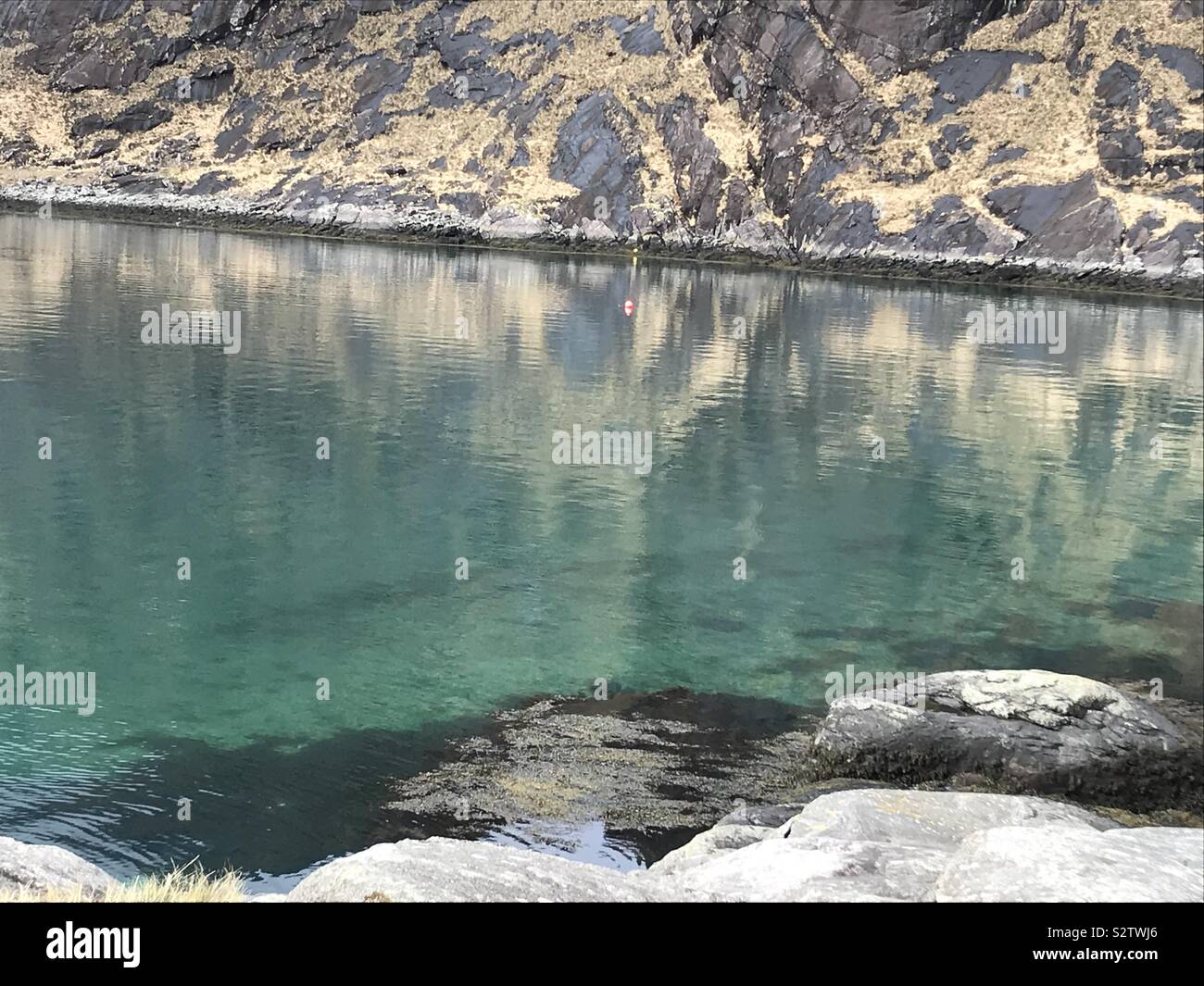 Sea reflections, Isle of Skye in early spring Stock Photo