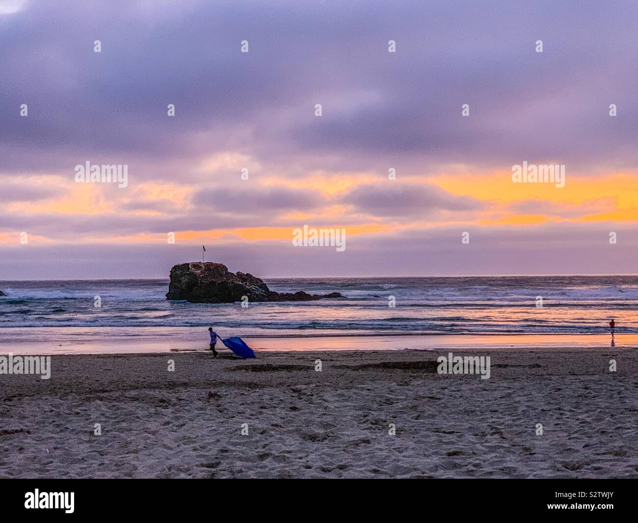 Perran sands beach in Perranporth Cornwall during sunset in summer - Smartphone Captured Stock Image