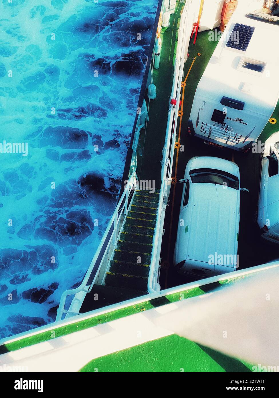 Steps and vehicles on moving ferry crossing The Minch from Tarbert on Isle of Harris to Uig on the Isle of Skye, Scotland - Smartphone Captured Stock Image