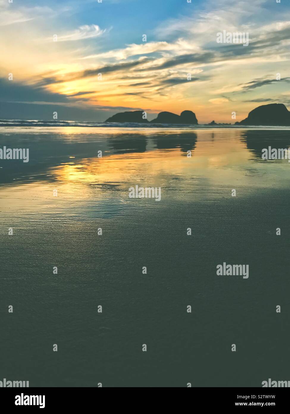 Summer sundown on Cannon Beach, North of Ecola Creek - Smartphone Captured Stock Image