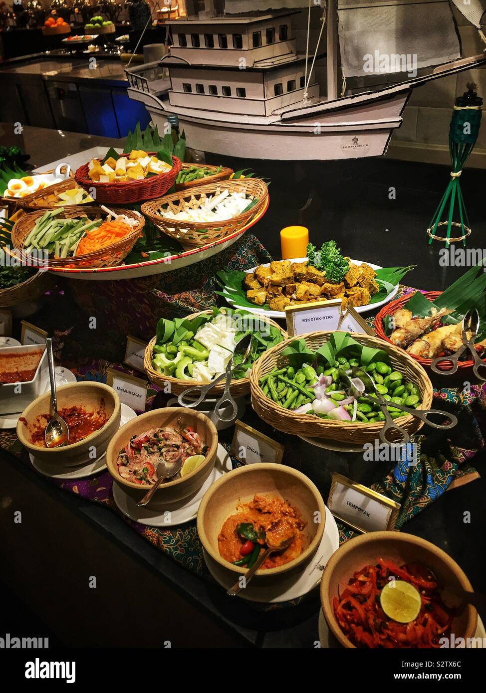 A selection of Malay sambals and other traditional accompaniments at the buffet in Sarkies restaurant, in the Eastern & Orient Hotel, George Town, Penang, Malaysia - Smartphone Captured Stock Image