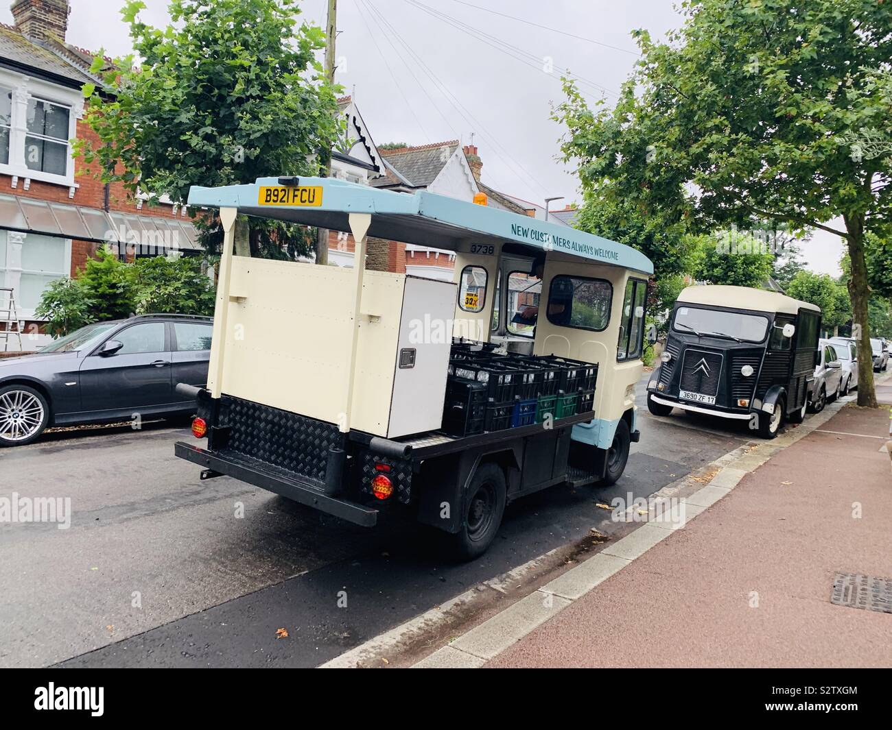 Milk float Stock Photo Alamy