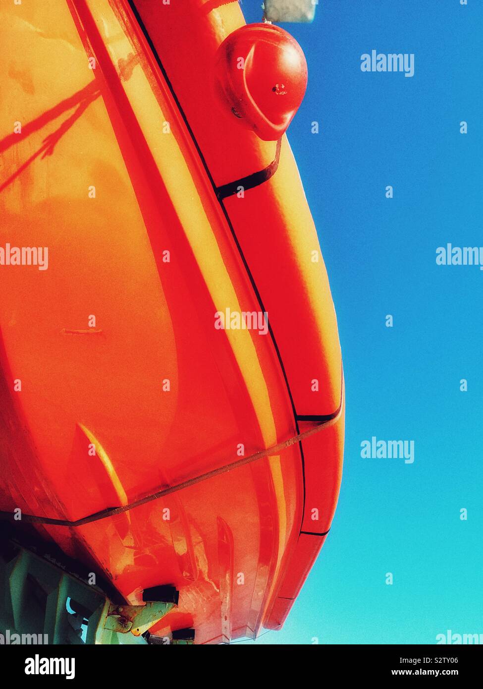 Orange Lifebelt from beneath against blue sky - Smartphone Captured Stock Image