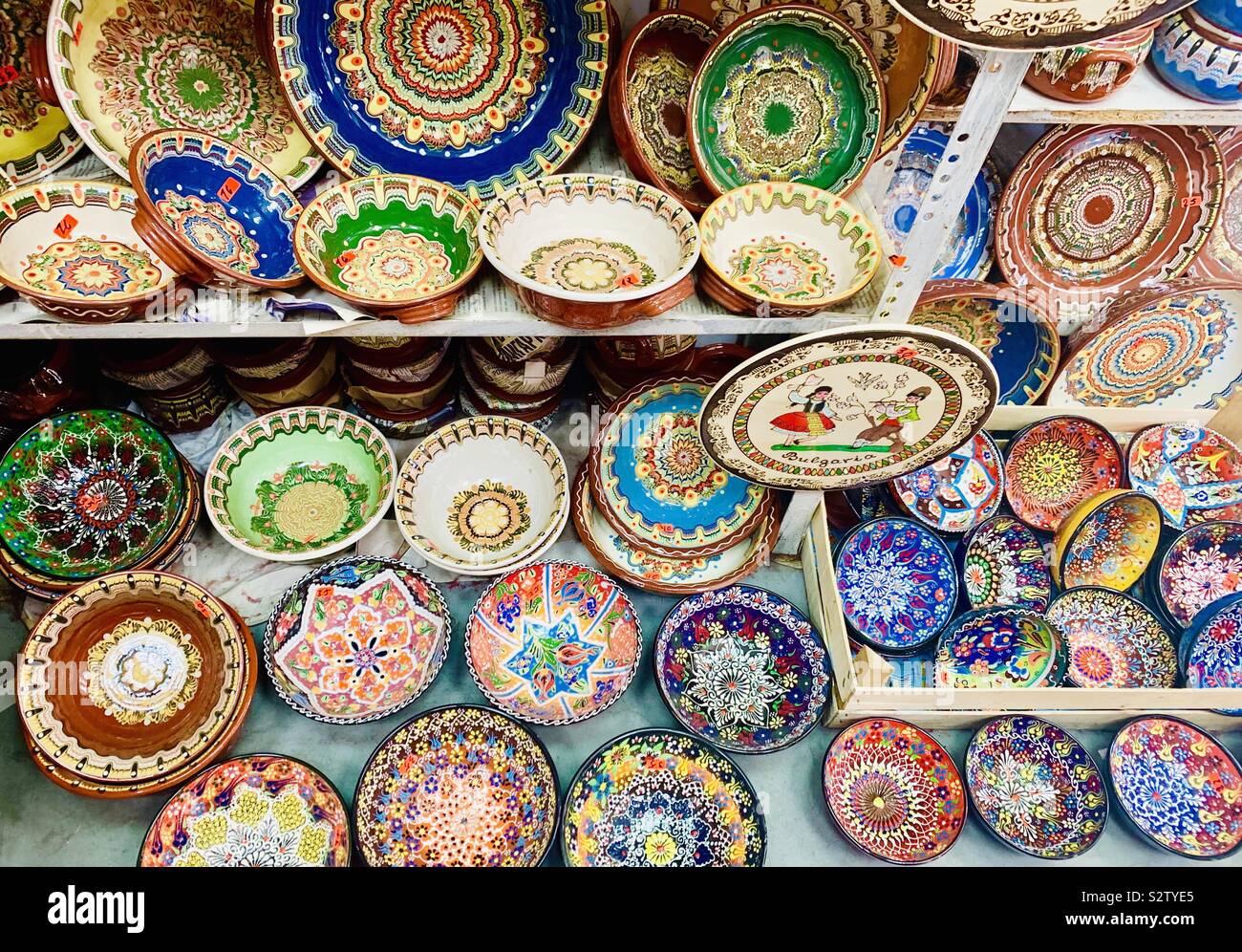 Traditional Bulgarian ceramic plates and bowls. - Smartphone Captured Stock Image
