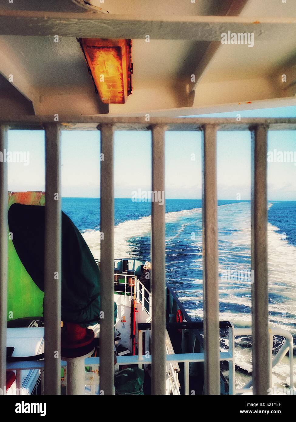 View of ships wake from stern of ferry crossing The Minch from Tarbert on Isle of Harris to Uig on the Isle of Skye, Scotland - Smartphone Captured Stock Image