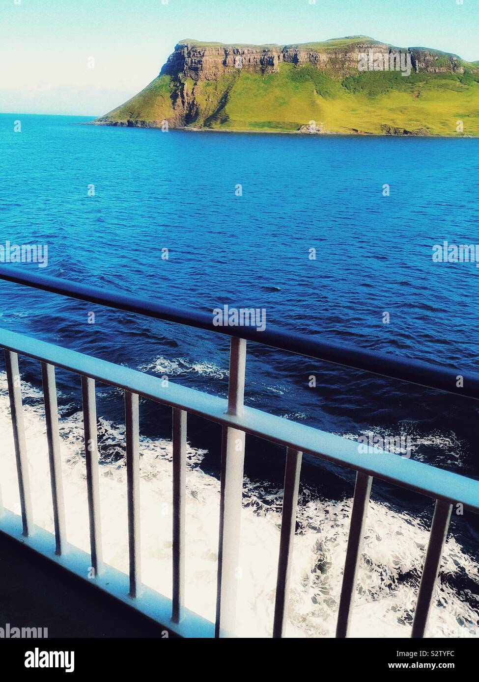 Boat passing the Trotternish Peninsula, Isle of Skye, Inner Hebrides, Scotland - Smartphone Captured Stock Image