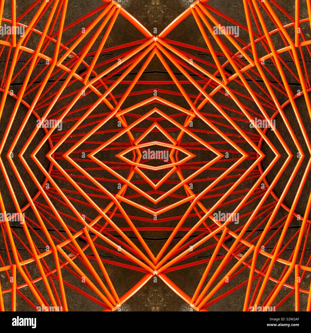 An abstract digital art pattern of orange lines and angles Stock Photo