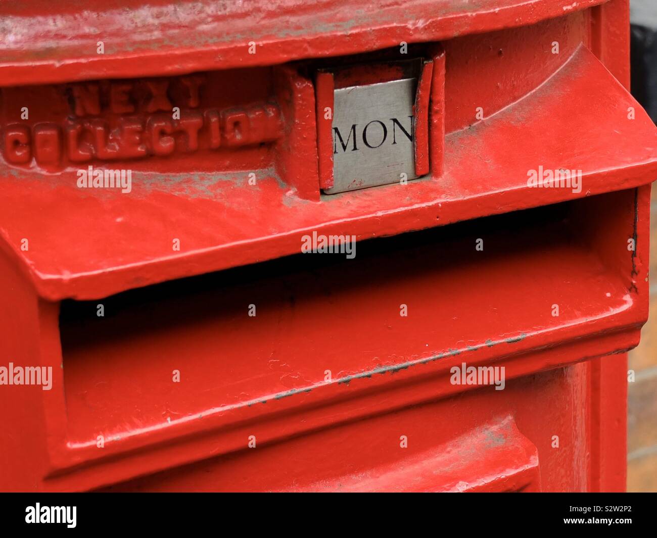 UK red Royal Mail post box. Delivery letters parcel and postage.  Strike.  Christmas post - Smartphone Captured Stock Image