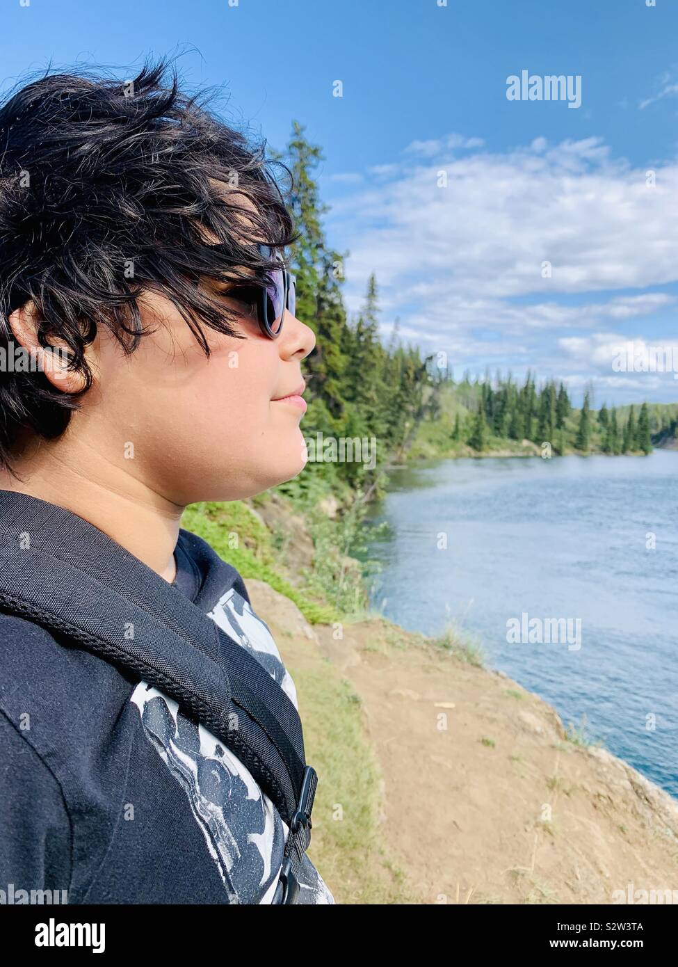 10 year old enjoying the great outdoors in the Yukon Stock Photo