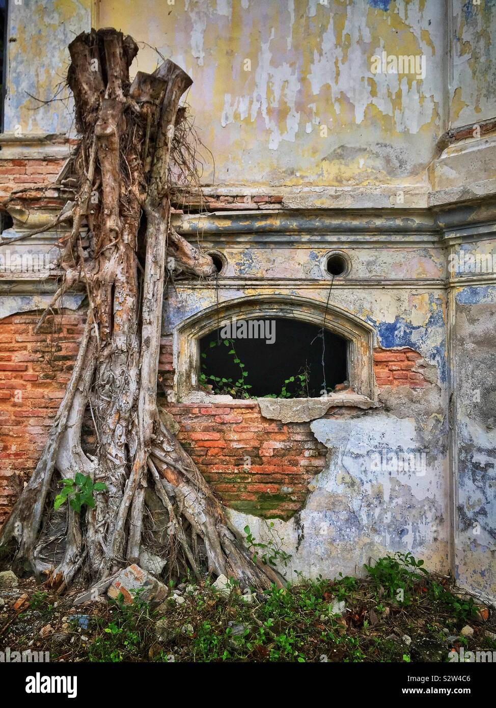 Detail of the façade of the derelict Goh Chan Lau ('Five-Storey Bungalow'), built in the late 19th century and formerly the Shih Chung Branch School, George Town, Penang, Malaysia - Smartphone Captured Stock Image