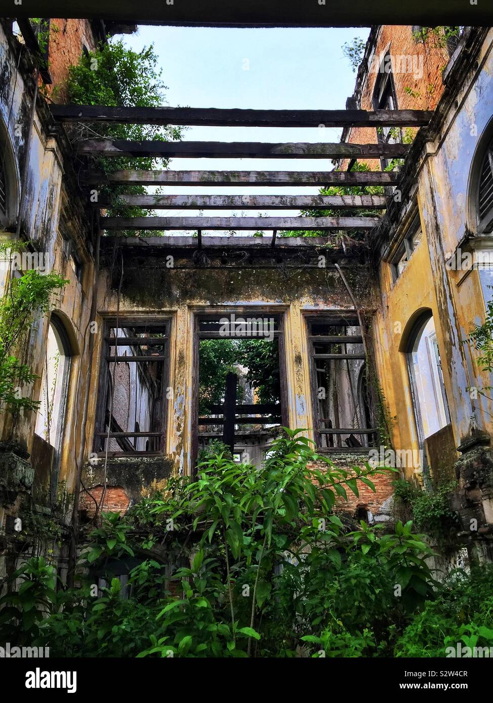 Interior of the derelict Goh Chan Lau ('Five-Storey Bungalow'), built in the late 19th century and formerly the Shih Chung Branch School, George Town, Penang, Malaysia - Smartphone Captured Stock Image