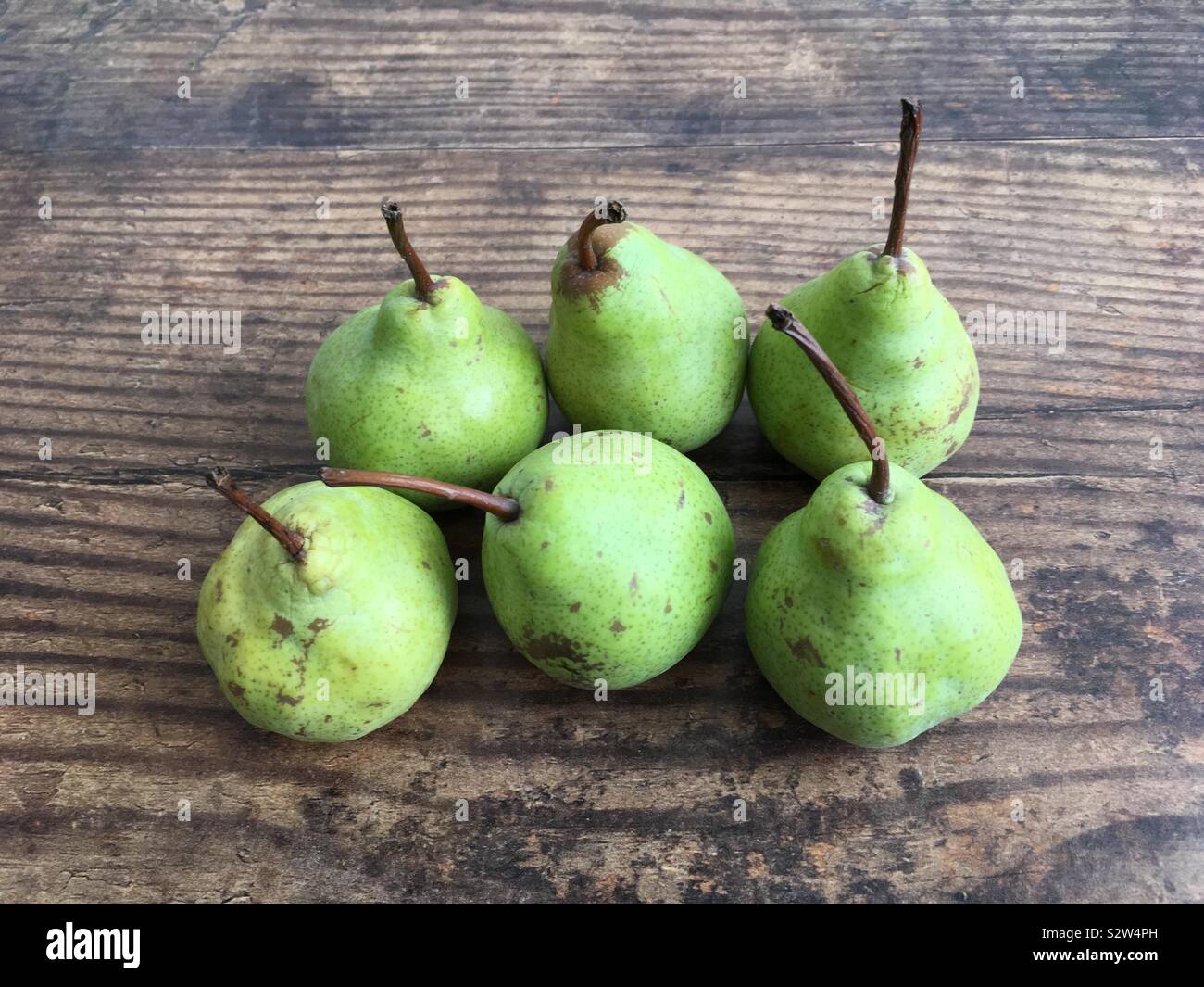 Pears on a wooden surface - Smartphone Captured Stock Image