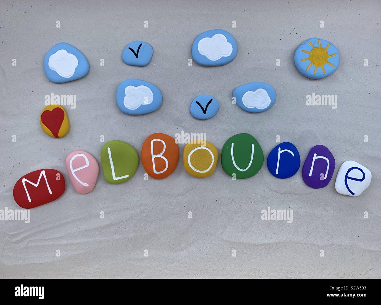 Melbourne, souvenir composed with painted stones over white sand Stock Photo