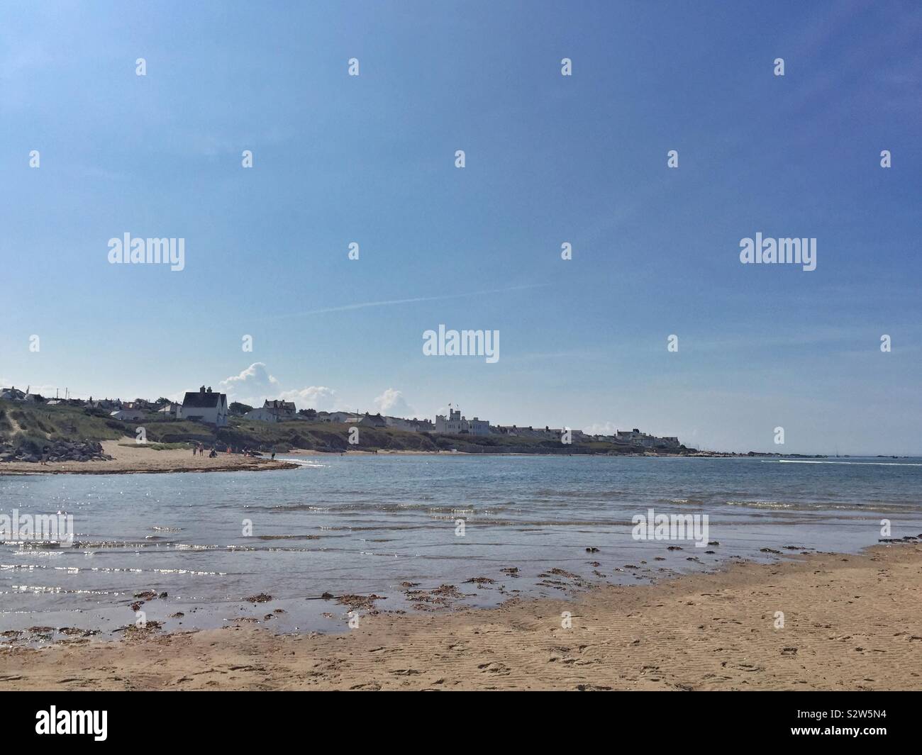 View of a Rhosneigr Beach, traeth Crigyll from Traeth Cymyran on a sunny day in August, Anglesey, North Wales - Smartphone Captured Stock Image