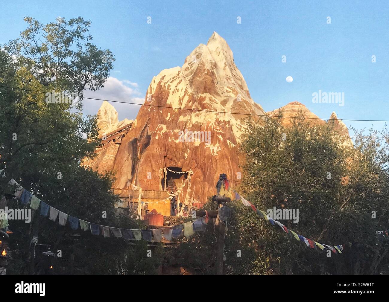 Expedition Everest Rollercoaster with the Moon above At Disney’s Animal Kingdom - Orlando, Florida USA Stock Photo