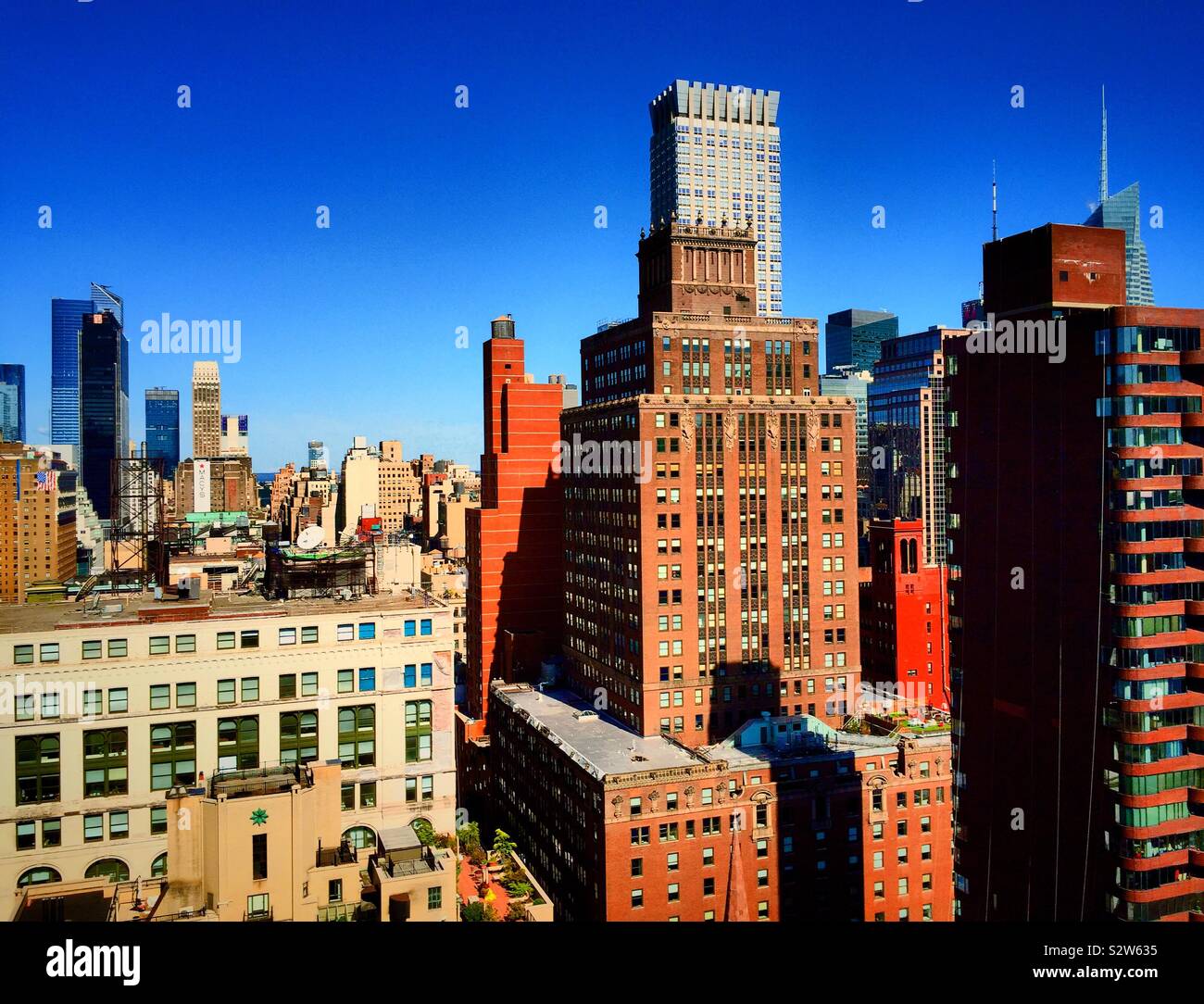 View of midtown Manhattan skyscrapers from a roof deck in Murray Hill, NYC, USA - Smartphone Captured Stock Image