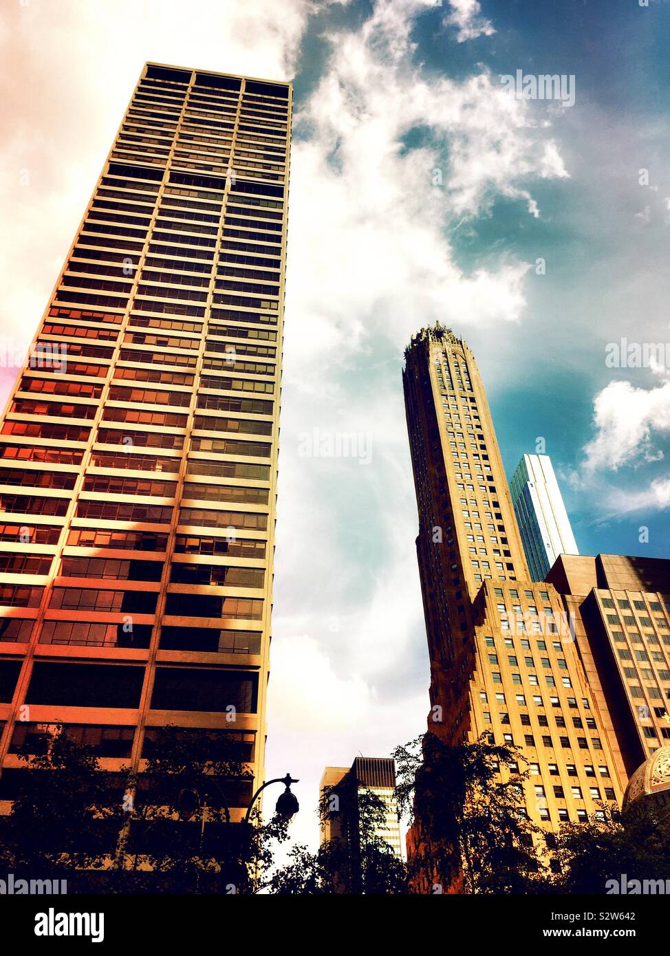 Tall skyscrapers line Park Avenue in midtown Manhattan, including the general electric building, NYC, USA - Smartphone Captured Stock Image