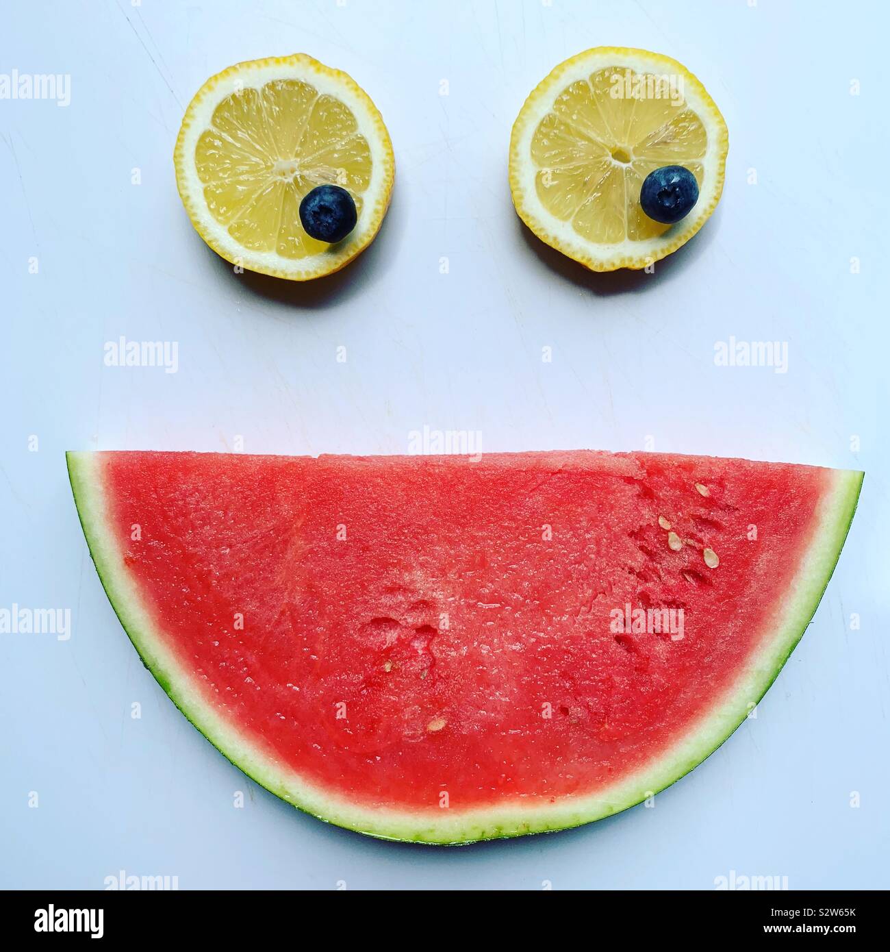 Fresh fruits in the shape of a happy face. Stock Photo