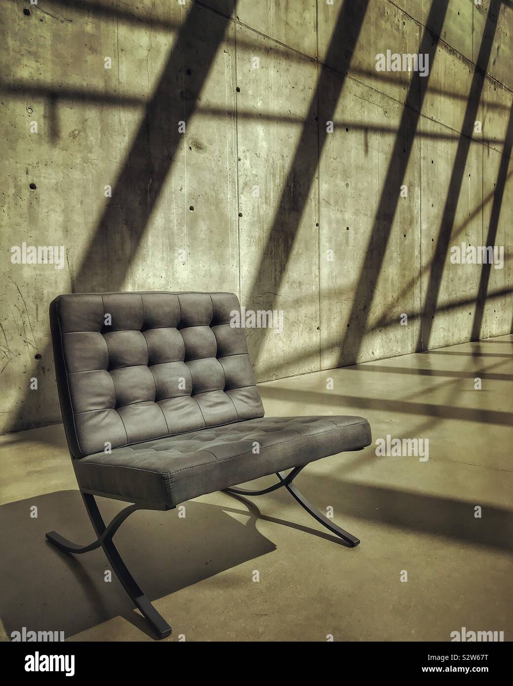 Modern chair in a contemporary interior - Smartphone Captured Stock Image