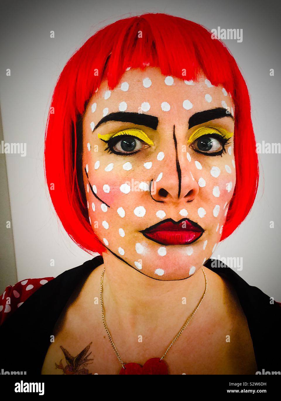 Pop art face paint on a woman Stock Photo - Alamy