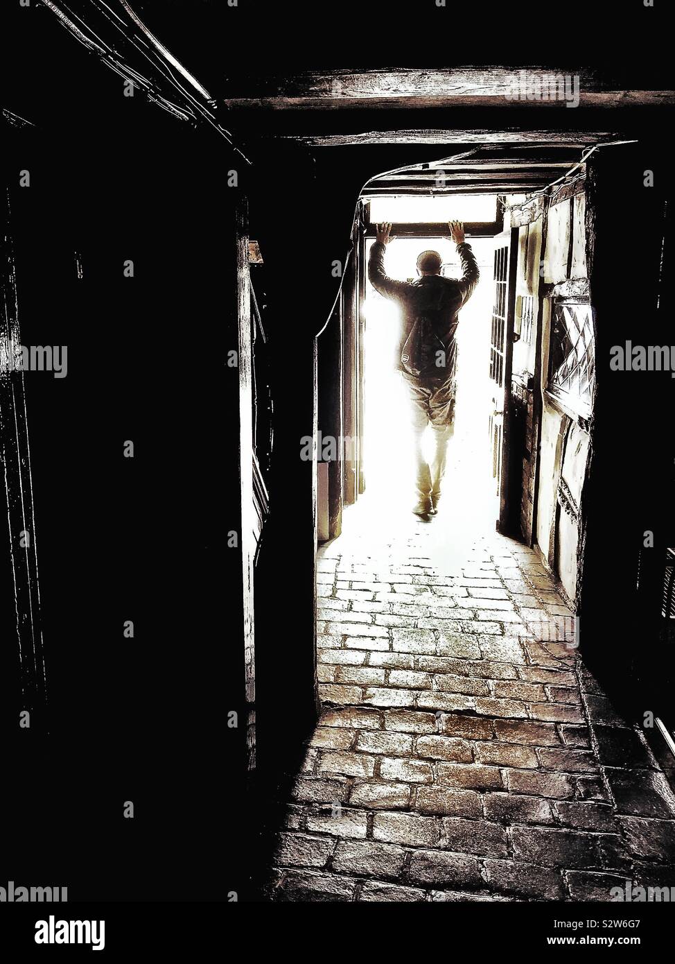 A man in a shadow. - Smartphone Captured Stock Image