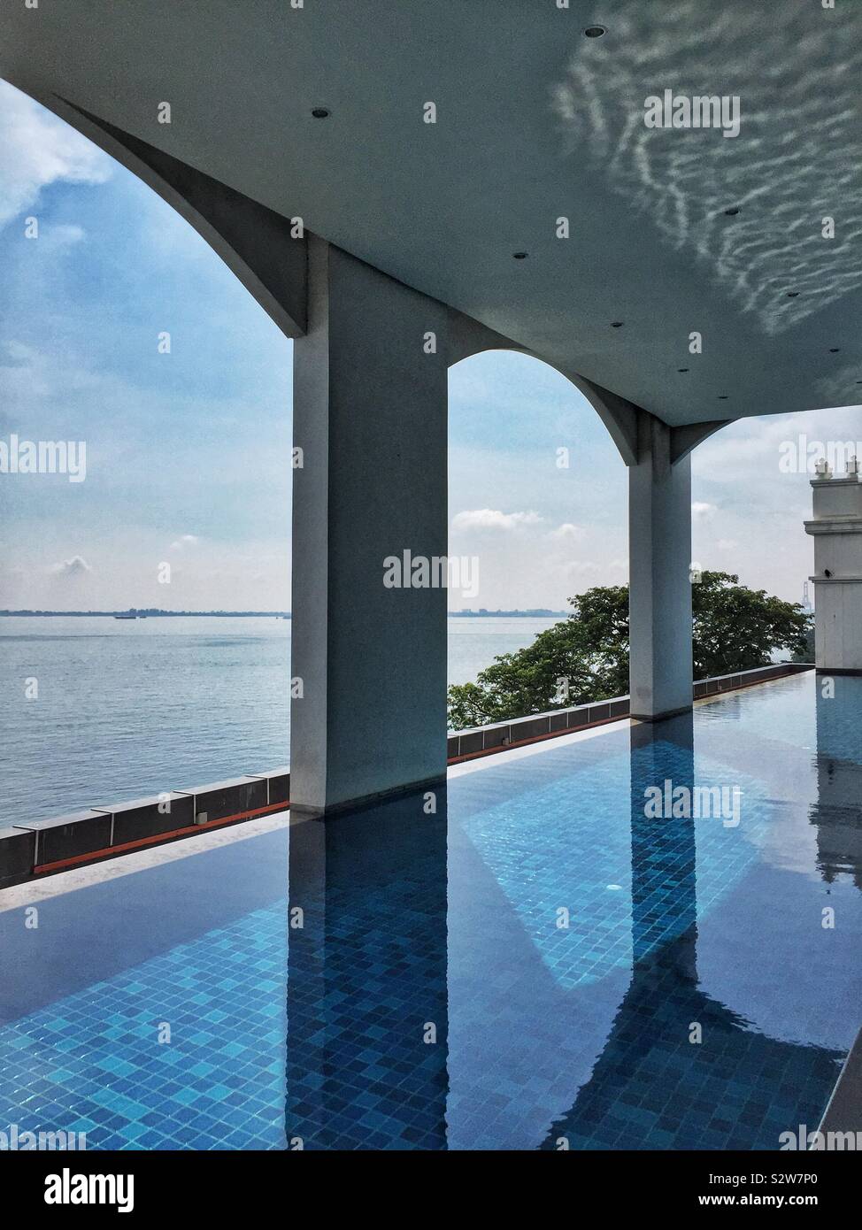 The pool in the Victory Annexe of the Eastern & Orient Hotel, Penang, Malaysia - Smartphone Captured Stock Image