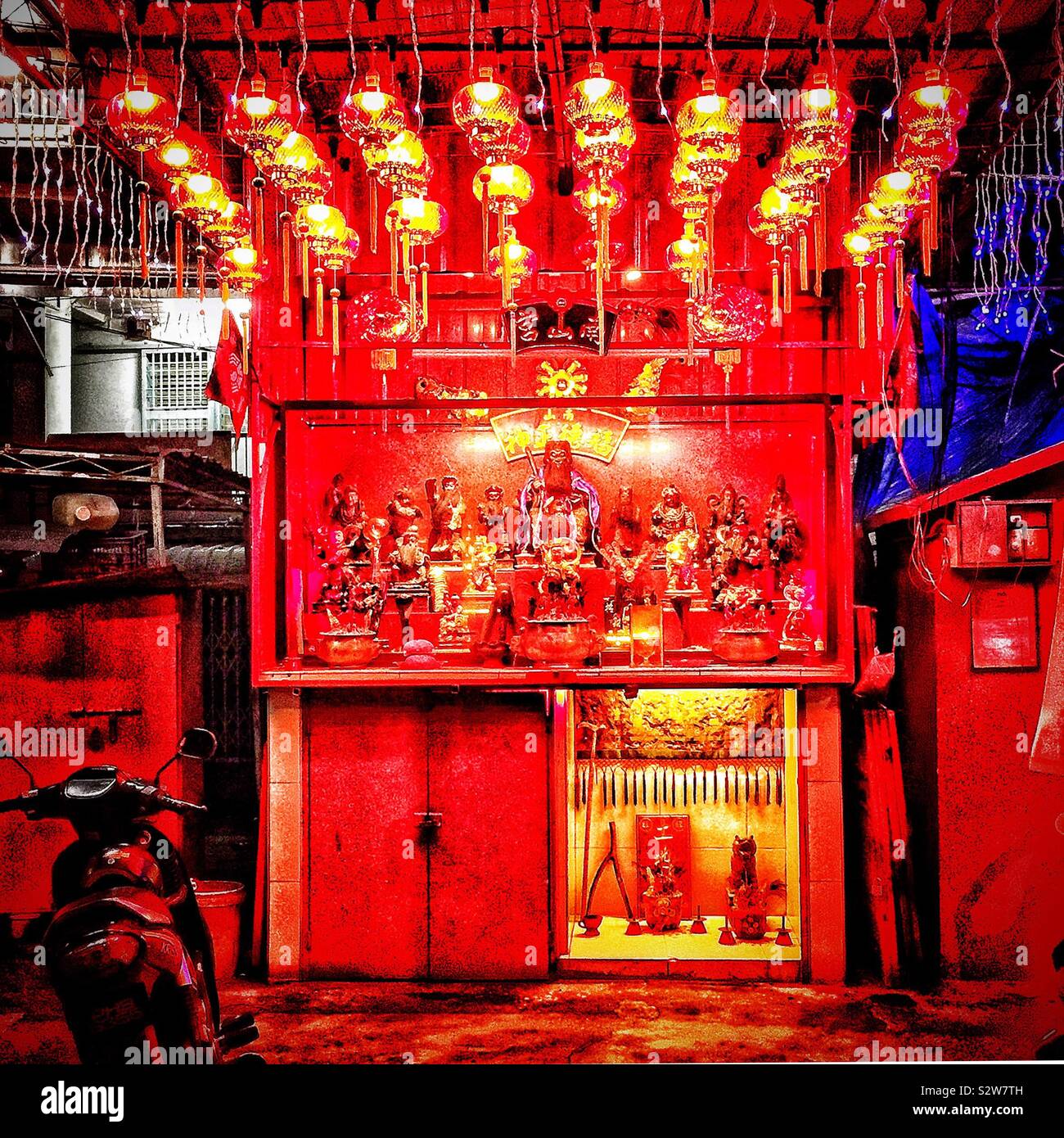 A shrine at night in the Old Town of George Town, Penang, Malaysia - Smartphone Captured Stock Image