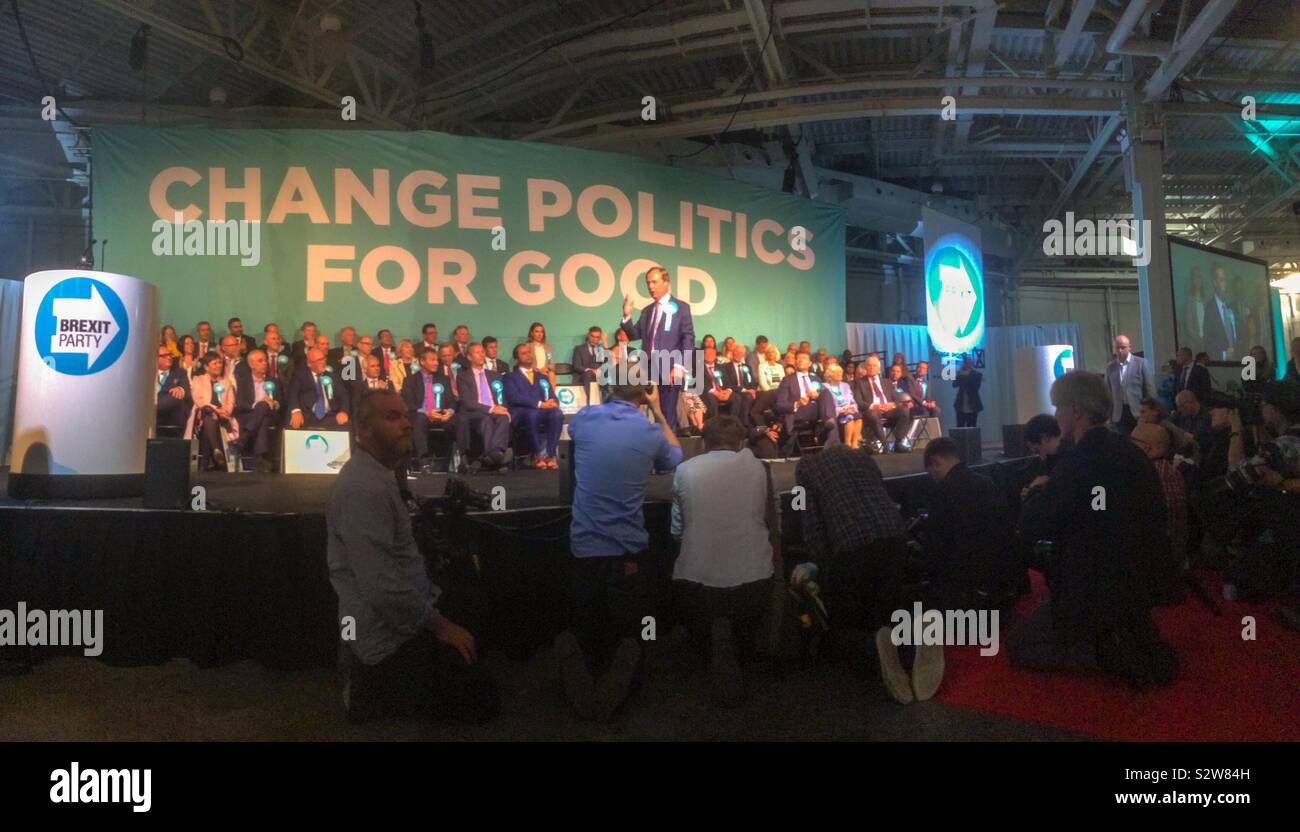 Nigel Farage addresses a meeting of the Brexit Party at Olympia, London - Smartphone Captured Stock Image