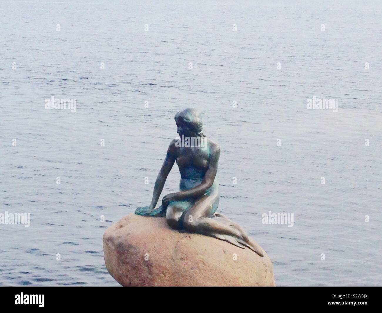 Mermaid on rocks hires stock photography and images Alamy