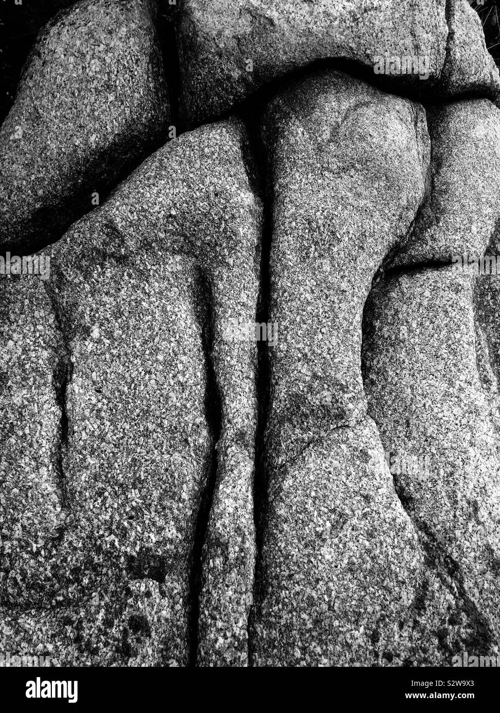 Weathered rocks by the beach on the northern shore of the Manjung River estuary, near Lumut, Perak, Malaysia - Smartphone Captured Stock Image