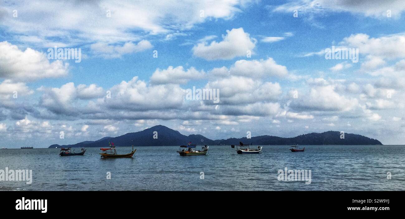 Fishing boats, Teluk Senangin Beach, near Lumut, Perak, Malaysia Stock Photo