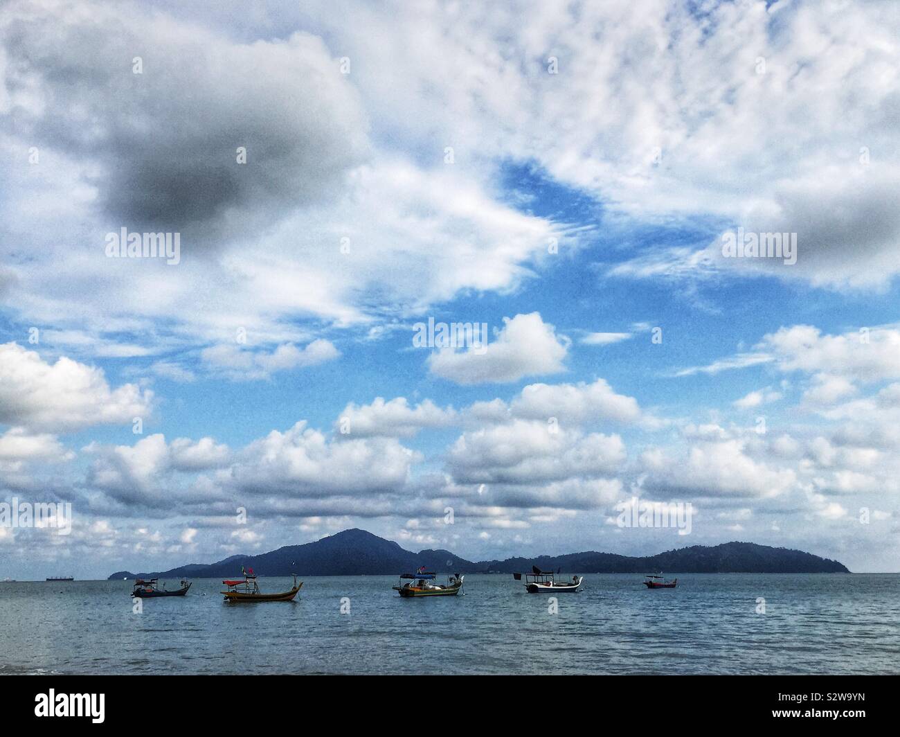 Fishing boats, Teluk Senangin Beach, near Lumut, Perak, Malaysia Stock Photo