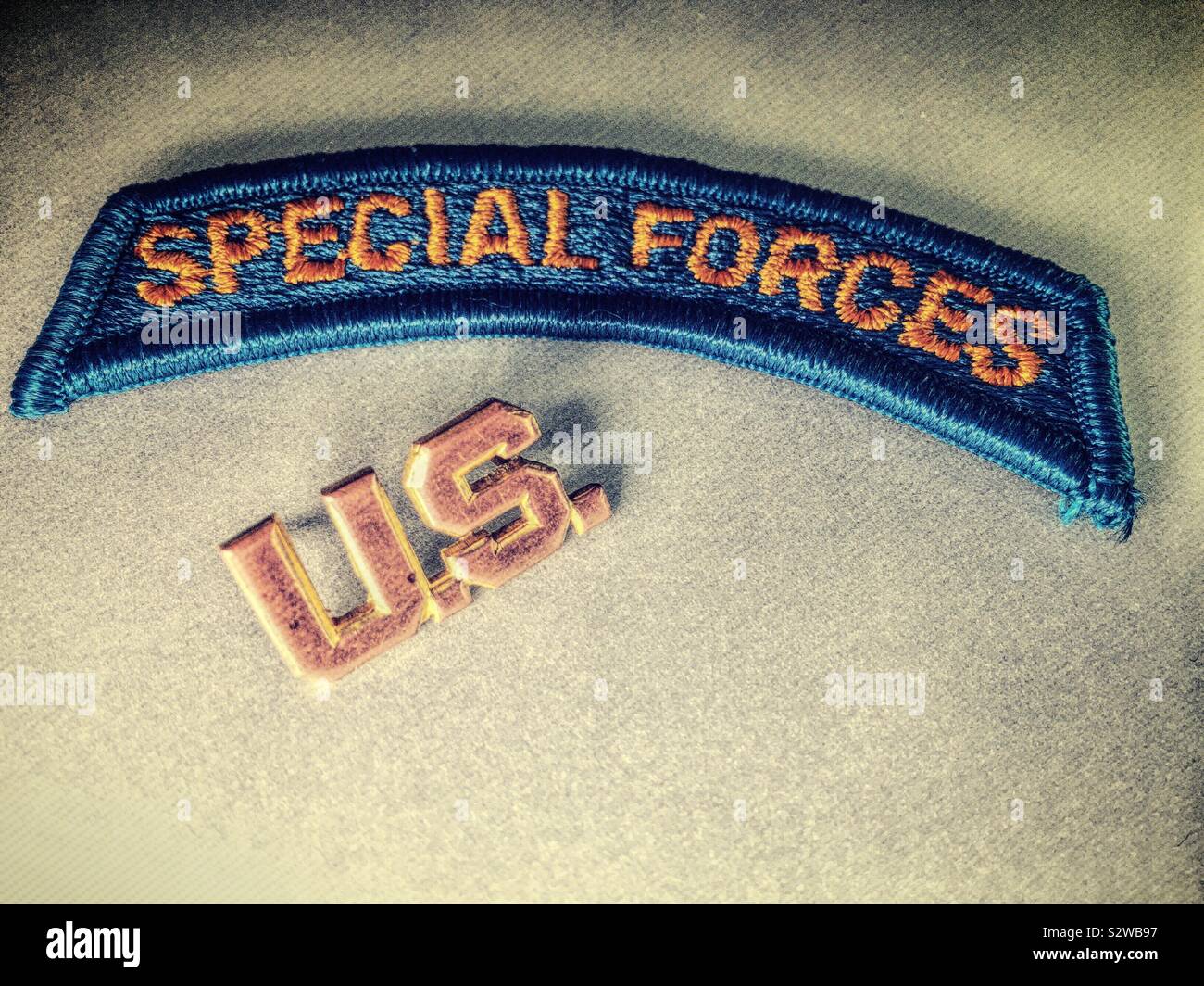 US Army special forces tab and US insignia pin, detail close up, USA Stock Photo