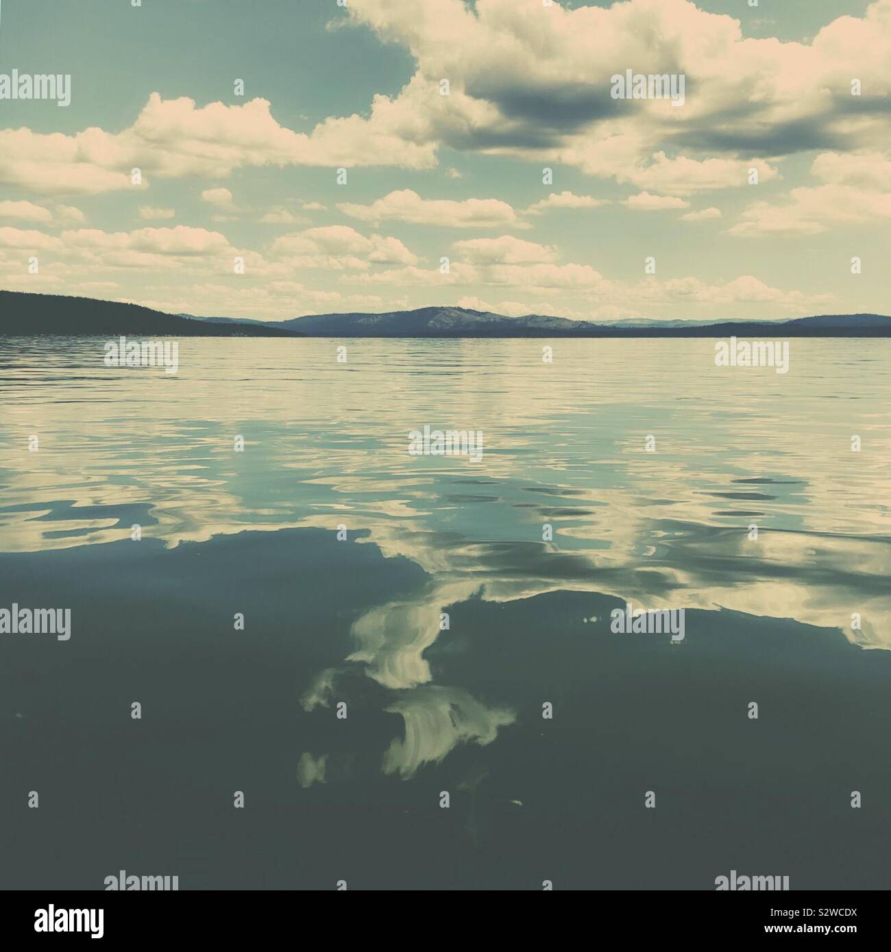 Clouds reflecting on the water hi-res stock photography and images - Alamy