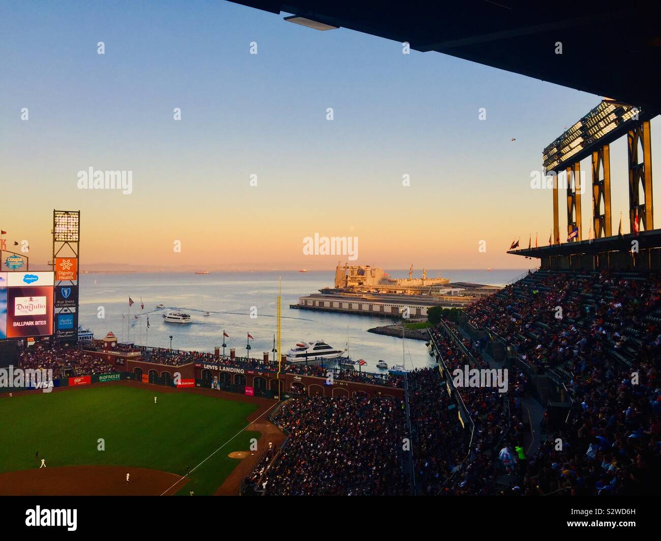 A view of the sunset in the San Francisco Bay from Oracle Park, Home to the Giants of Major League Baseball. Stock Photo