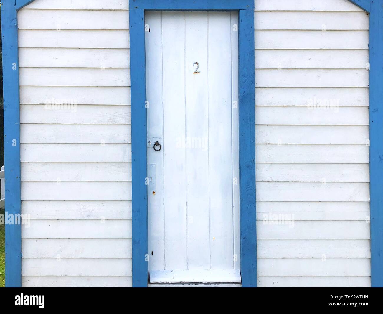 Blue and white beach hut, Westward Ho, Devon, England. - Smartphone Captured Stock Image