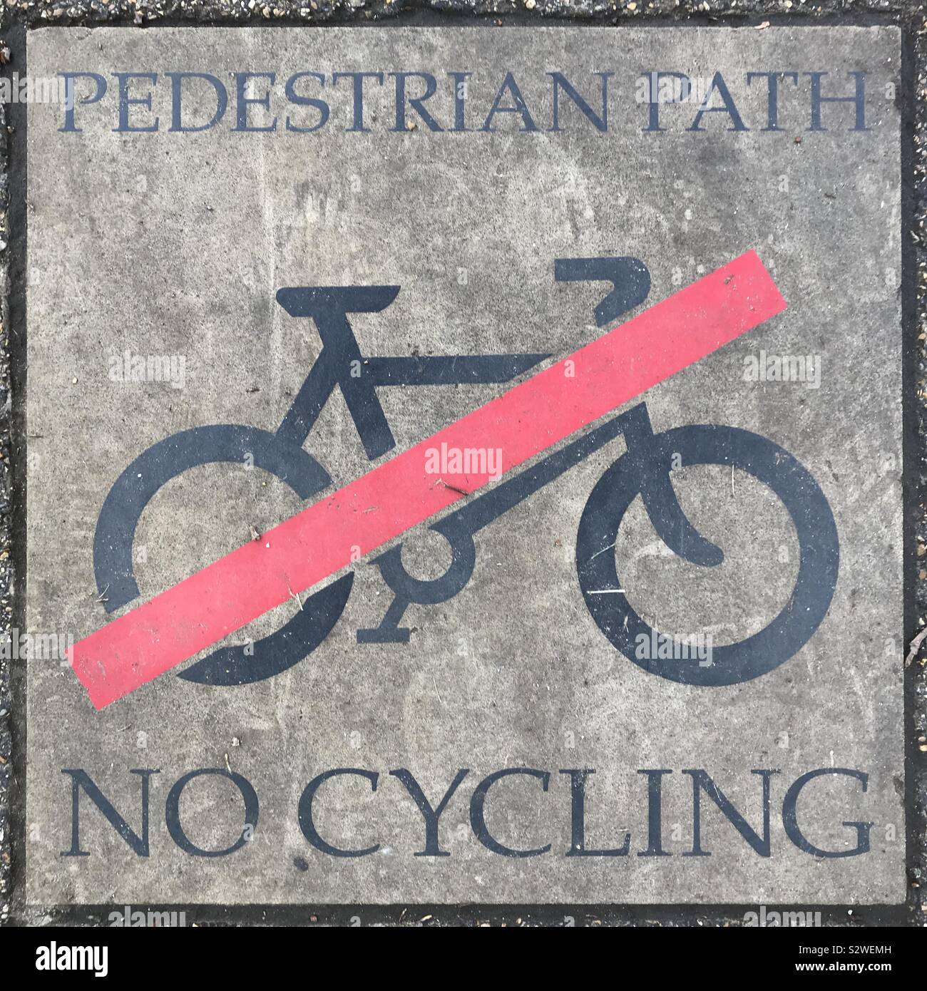 No cycling sign on the pedestrian lane in the public park. - Smartphone Captured Stock Image