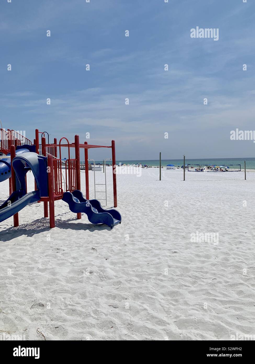 Outdoor play equipment on white sand beach Stock Photo