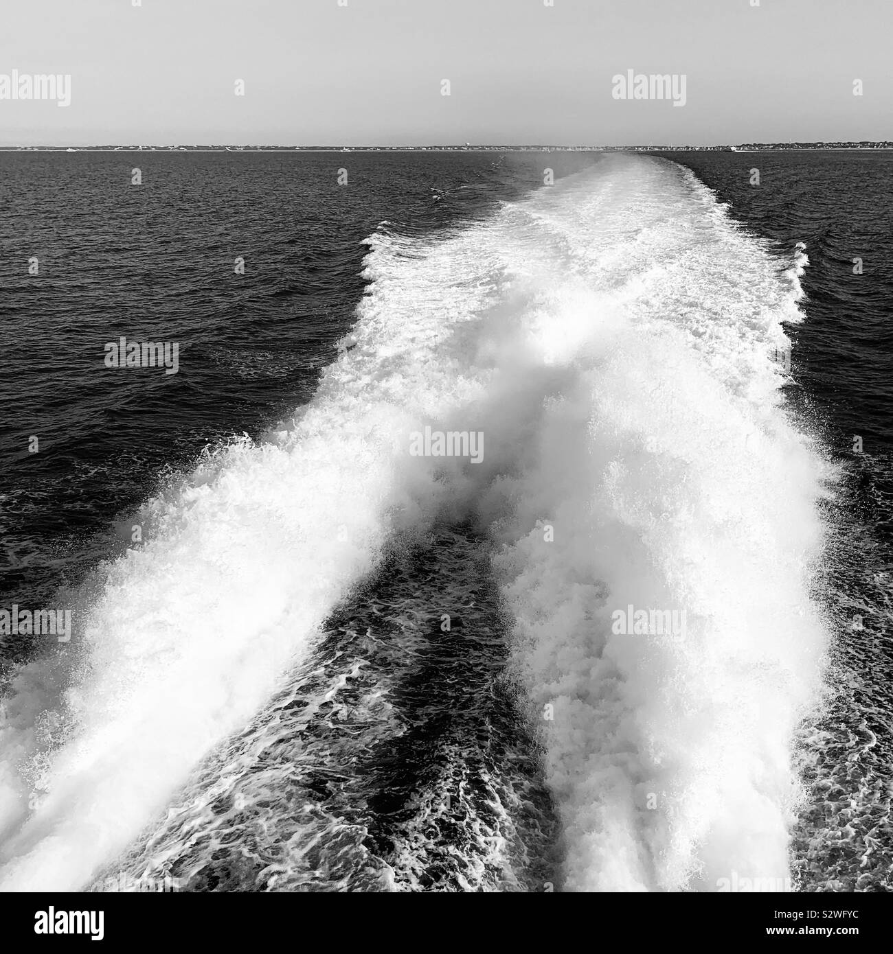 Black and white image of a ferry boat’s wake Stock Photo - Alamy