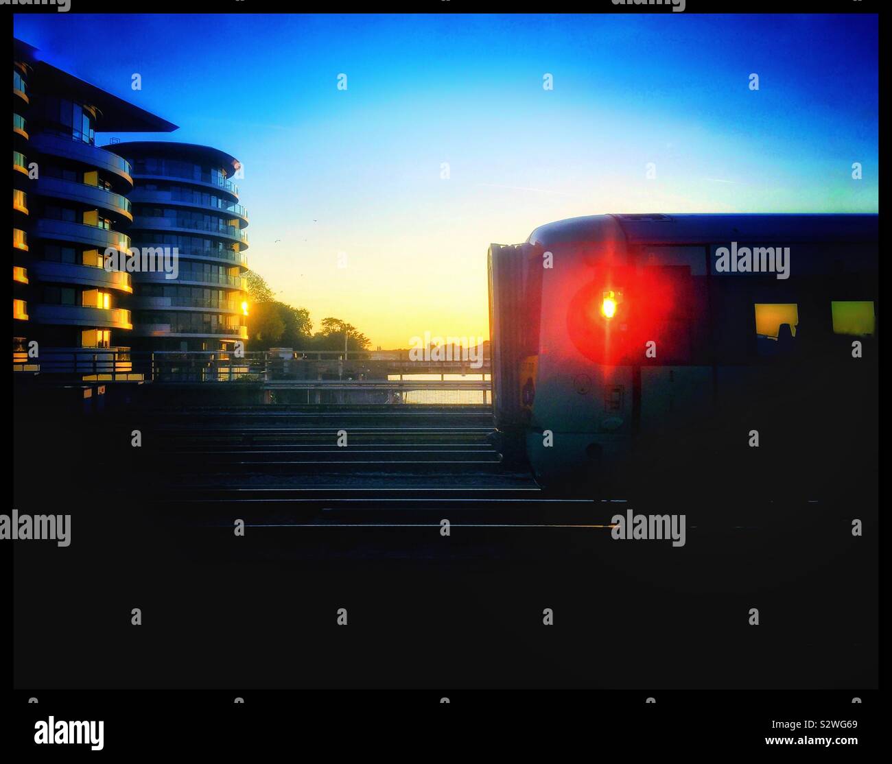 Commuter train at Battersea at sunset - Smartphone Captured Stock Image