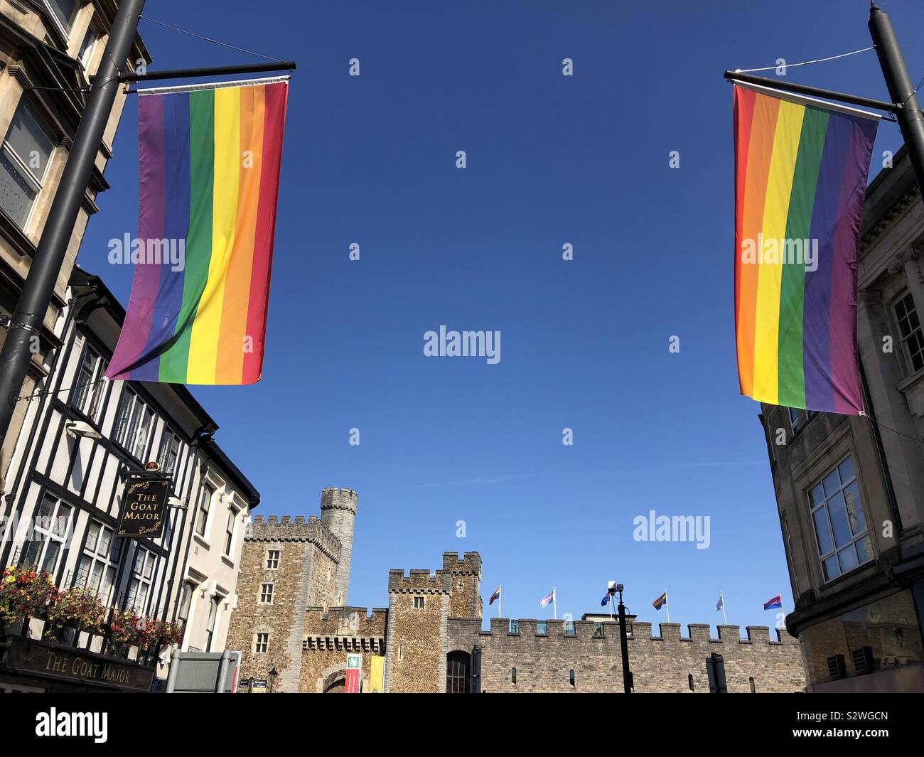 LGBT flags flying in St Mary’s Street, Cardiff, before Cardiff Pride. - Smartphone Captured Stock Image LGBT flags flying in St Mary’s Street, Cardiff, before Cardiff Pride. - Smartphone Captured Stock Image
