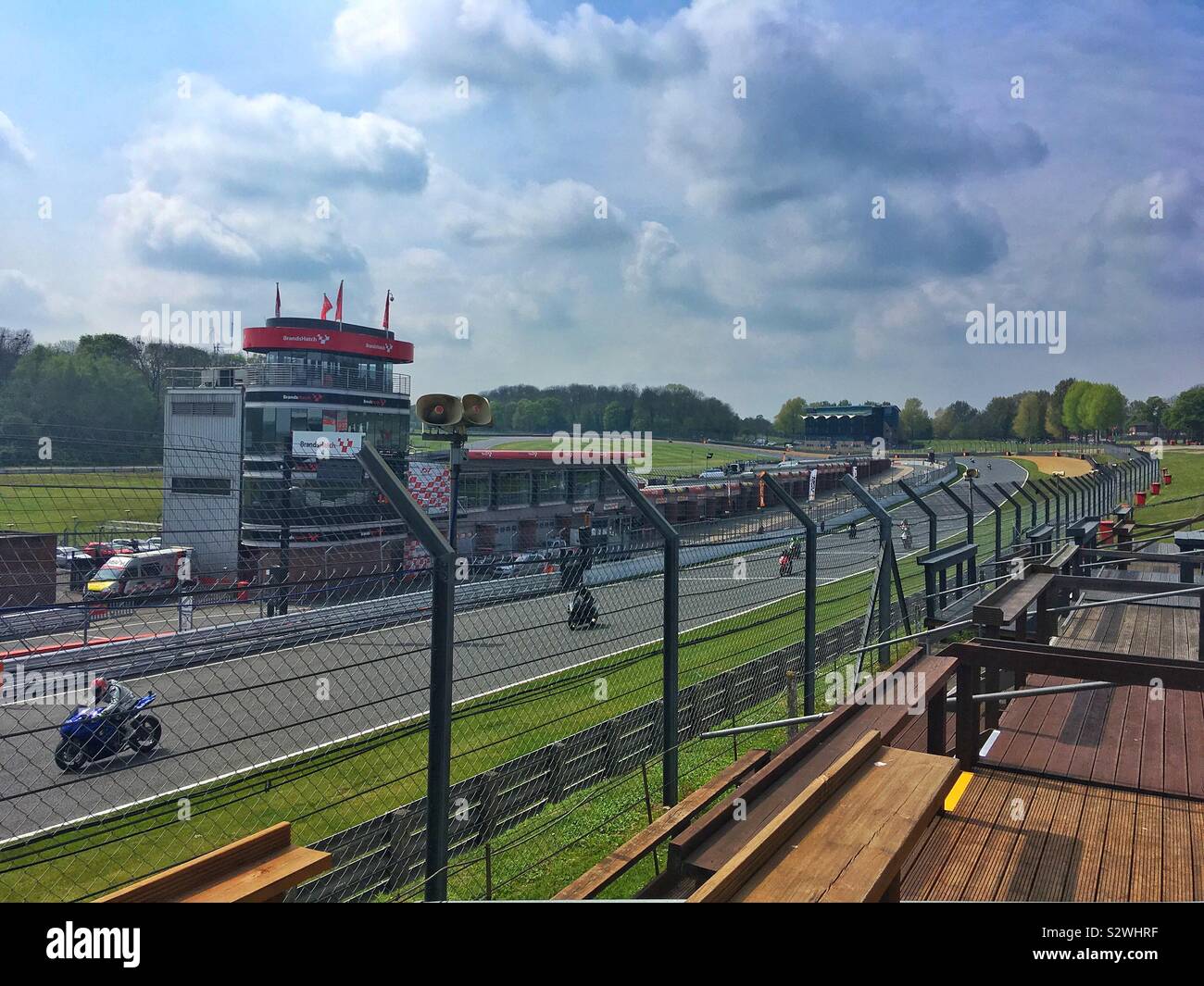 Motorcycle racing on a sunny day at Brands Hatch Stock Photo