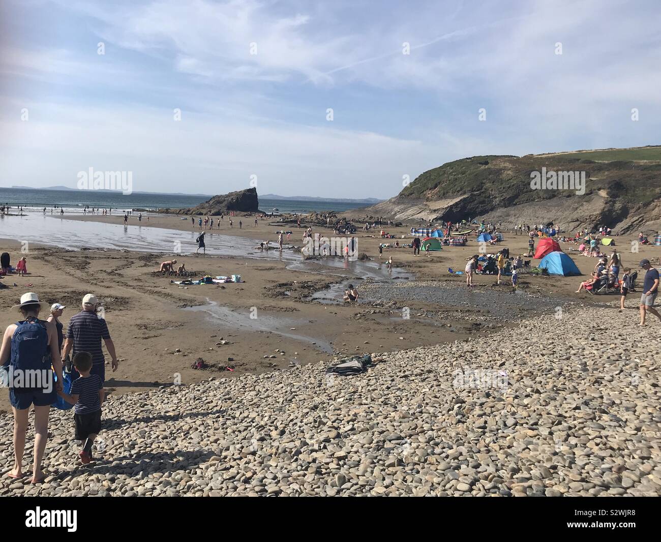 Bank holiday crowds in sunshine, Broad Haven, Pembrokeshire Stock Photo