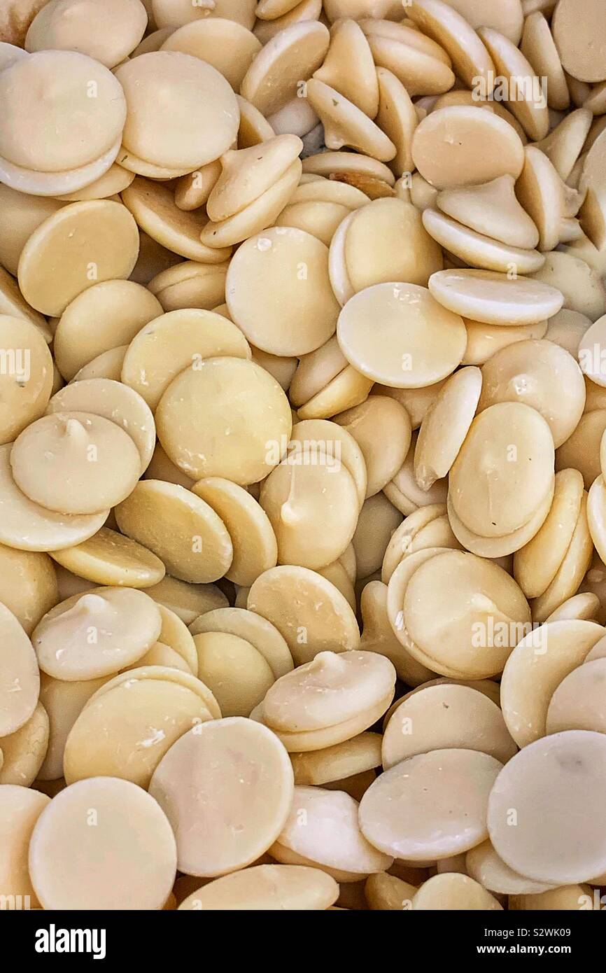 Full frame of many white chocolate chips. - Smartphone Captured Stock Image