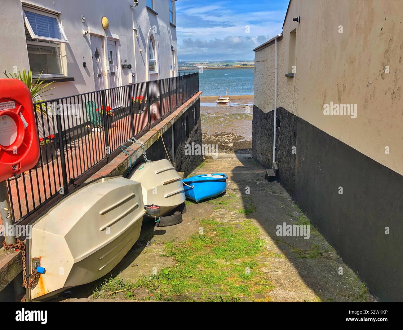 View between two houses towards the Torridge estuary from Irsha Street, Appledore, August. - Smartphone Captured Stock Image