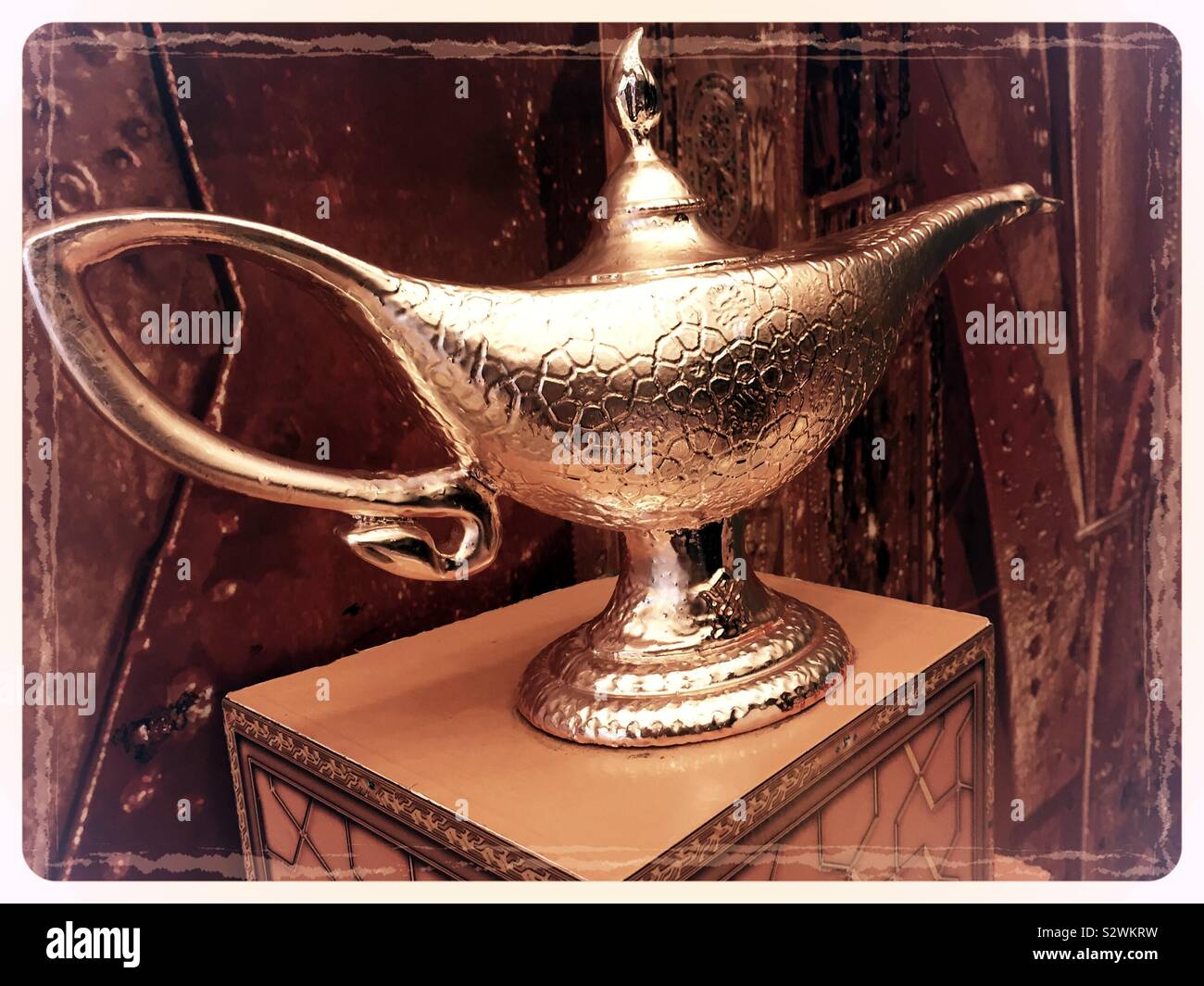 Still life of Aladdin’s magic golden lamp - Smartphone Captured Stock Image